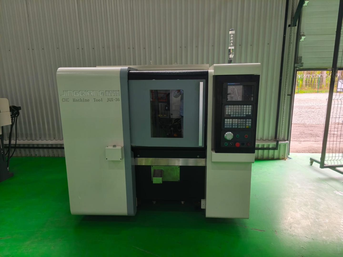Токарный станок JQX-36 c чпу с барфидером